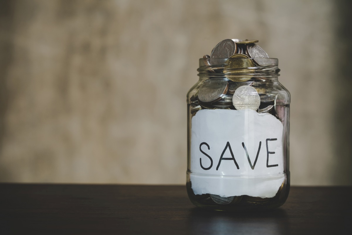 coins in a clear glass jar